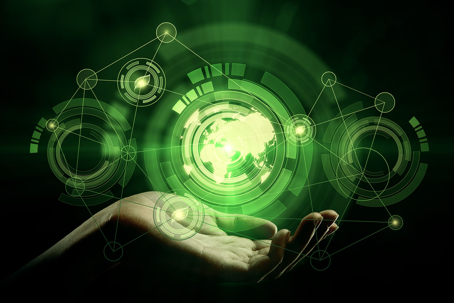 Conceptual image of a hand holding a futuristic projection of the world